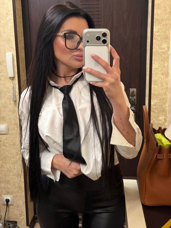 Woman Takes Mirror Selfie in Voronezh Room