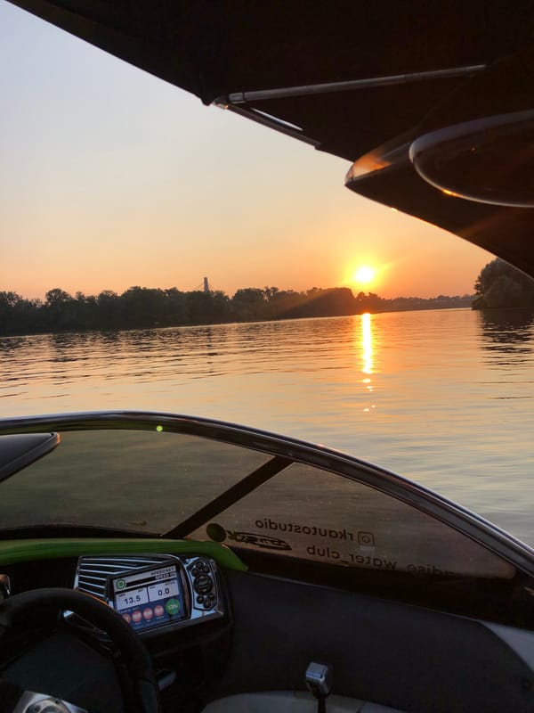 Sunset boat day with wakeboarding on the water