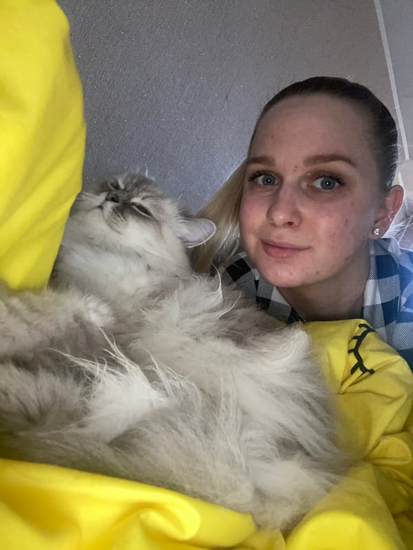 Woman documents afternoon with selfies and pet moments