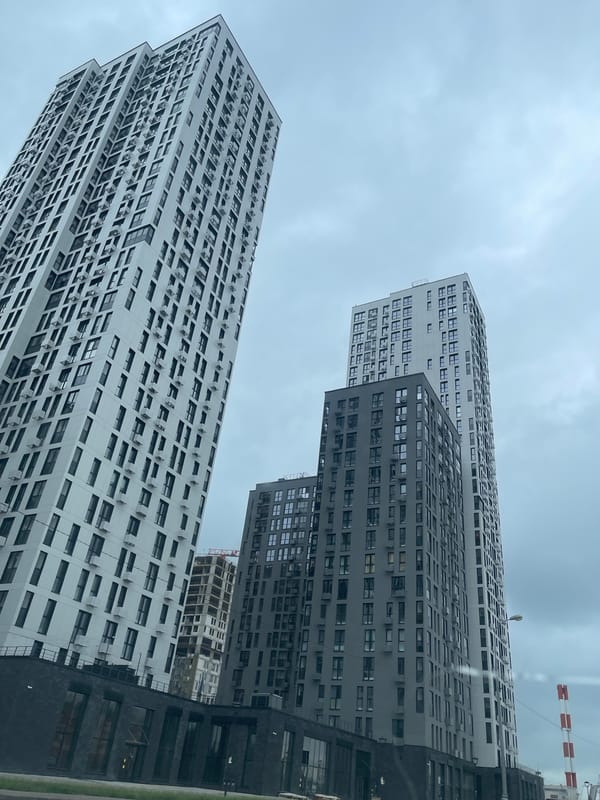 Driving through Moscow's new residential developments on a grey morning