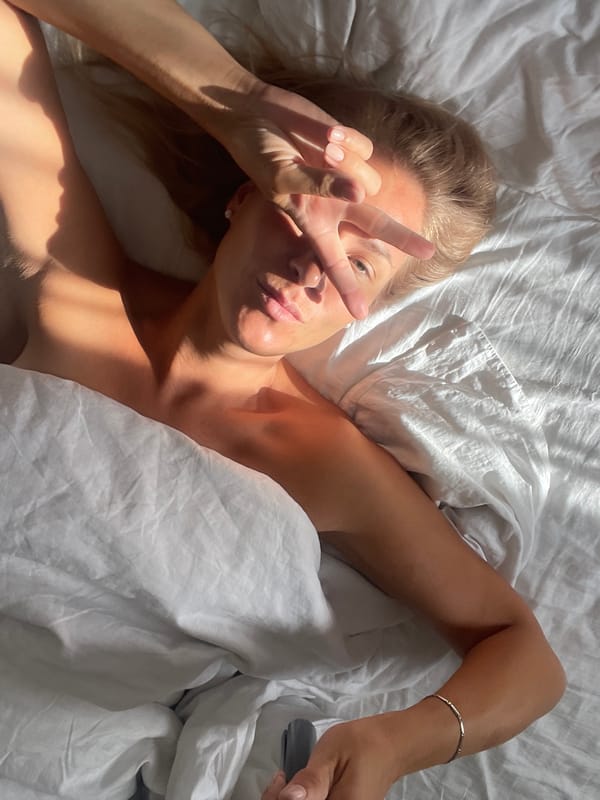 Sunlit bedroom scene in Sochi, lazy morning light and shadows