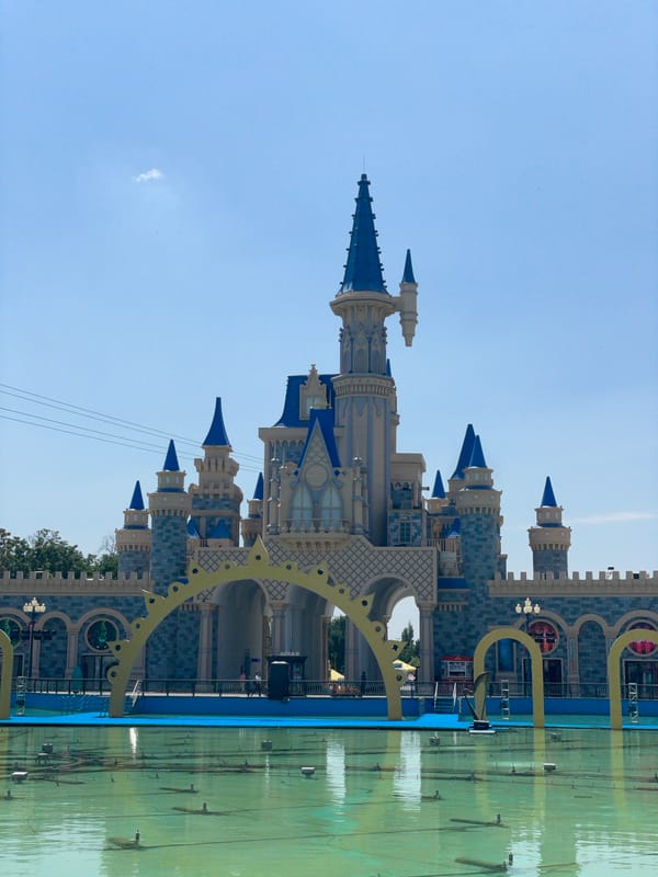 Amusement park visit in Tashkent with a Minecraft Kinder Joy in tow