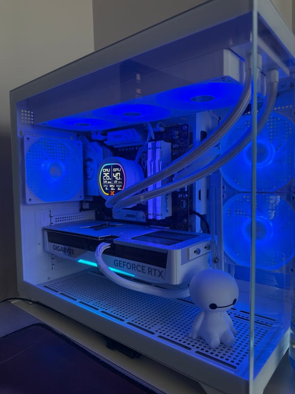 Computer case interior with blue LED fans documented in Bulgaria