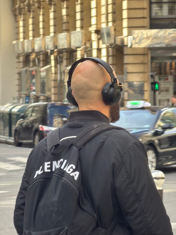 Afternoon street life documented across central Paris neighborhoods