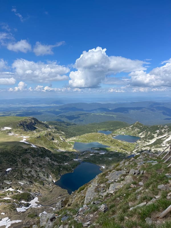 Hiking the Rila Mountains past glacial lakes and snow
