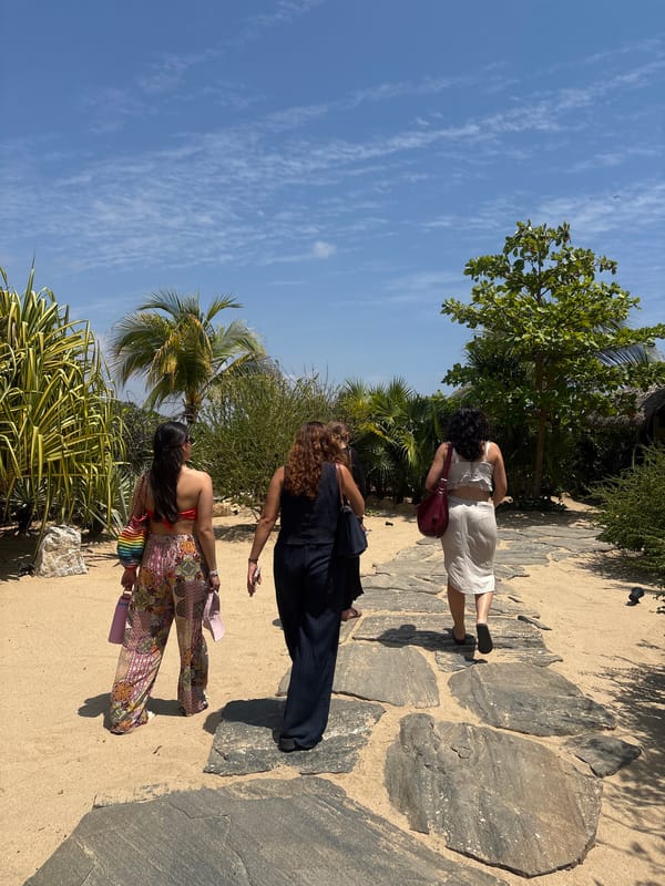 Women walk stone paths at Mexican cultural center