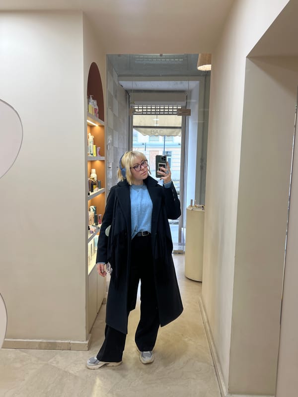 Woman takes selfie in Odesa hallway