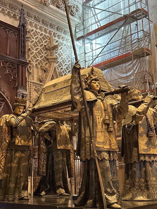 Tourist captures cathedral art during Seville visit