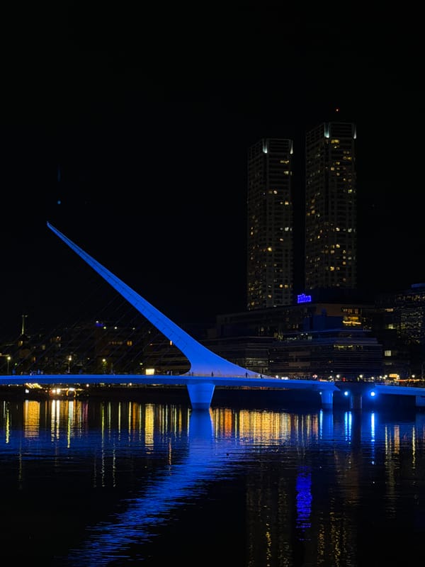 Night view of illuminated Puente de la Mujer bridge