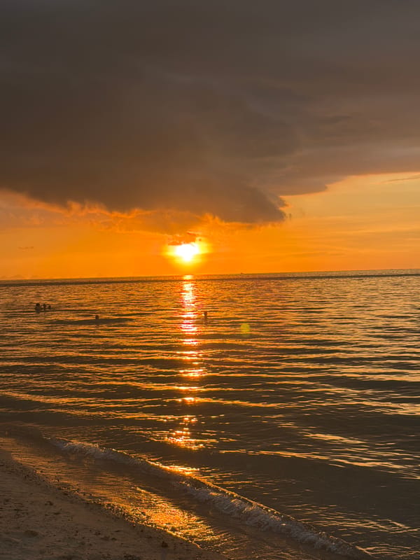 Sunset over Baan Tai beach with construction site views