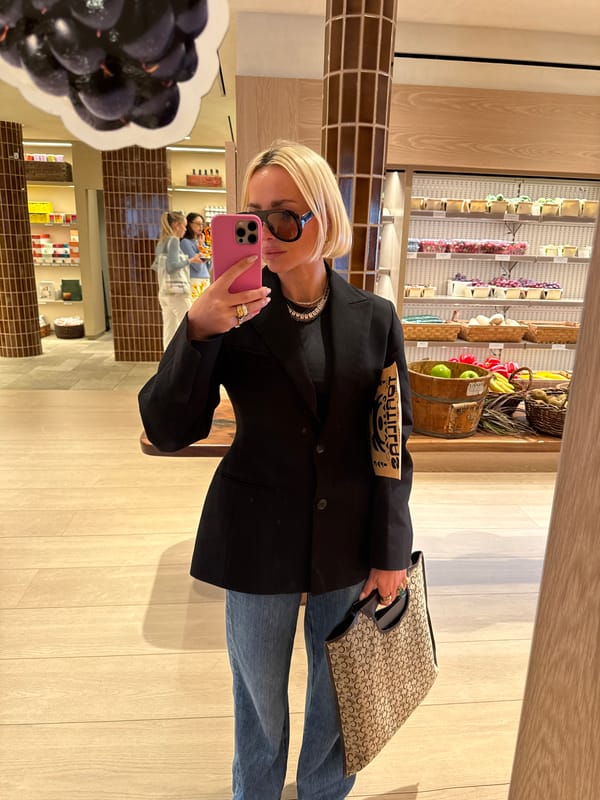 Visitor documents retail space with selfies, displays in NYC