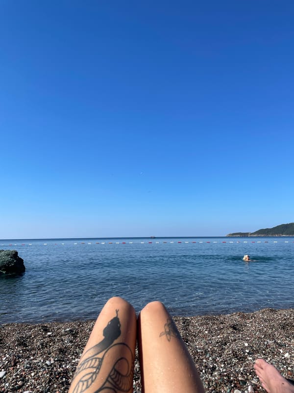 Lazy summer afternoon on a pebble beach in Montenegro