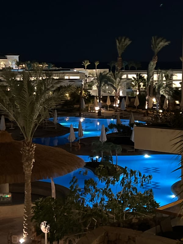 Dusk to night at a Sharm El Sheikh resort pool