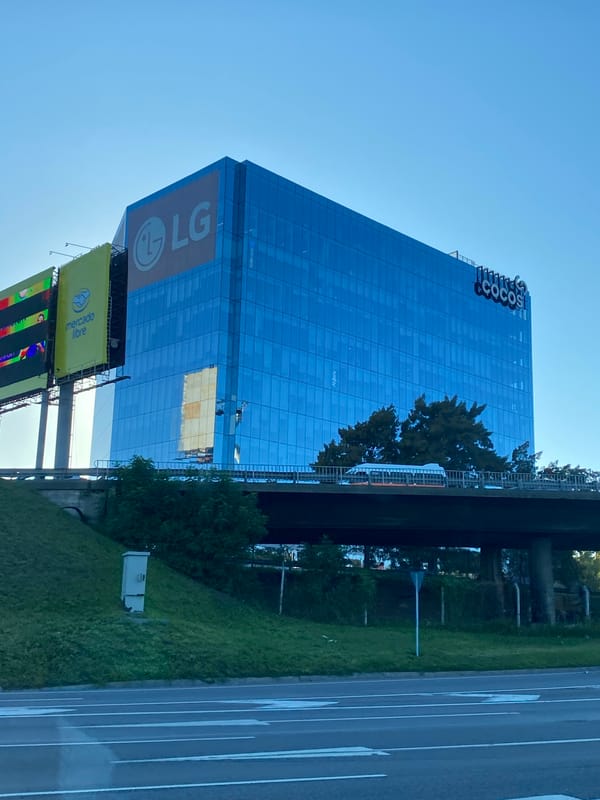 Corporate building with tech company signage observed in Vicente López