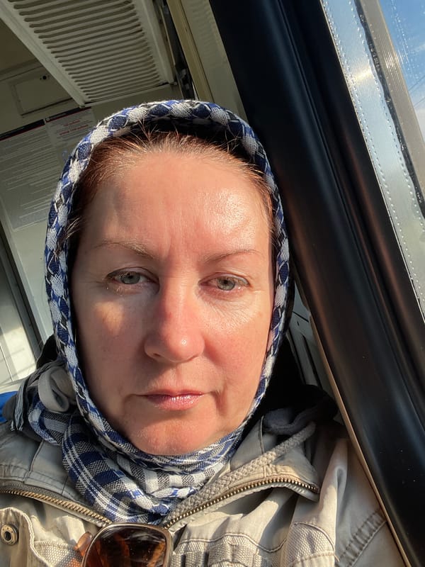 Woman Takes Selfie Near Window in Naumovo, Russia