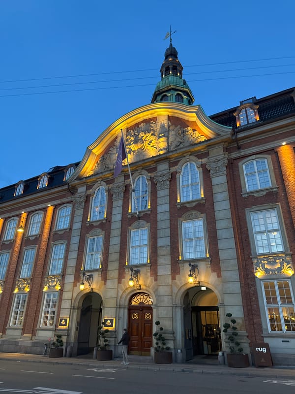 Historic Copenhagen building photographed during evening twilight hours