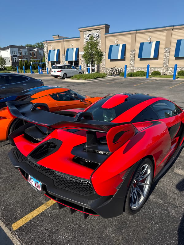 Luxury sports cars gather in Warrenville parking lot