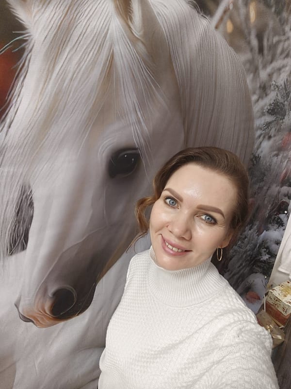 Woman takes multiple selfies in white sweater during morning photoshoot