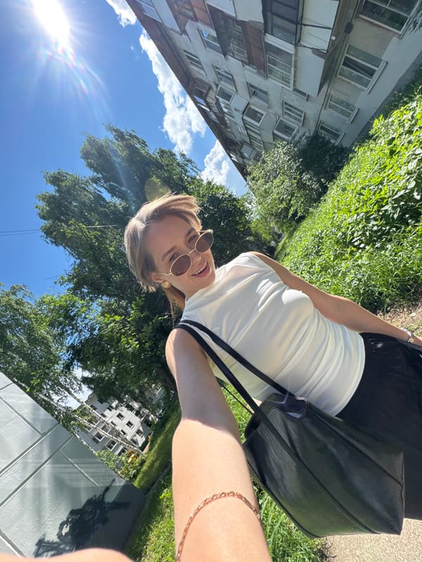 Woman documents morning with selfies and flowers in Chaikovsky