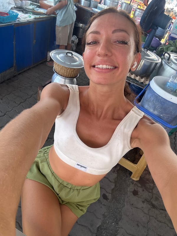 Woman visits street food vendor in บ้านบางรักษ์, Thailand