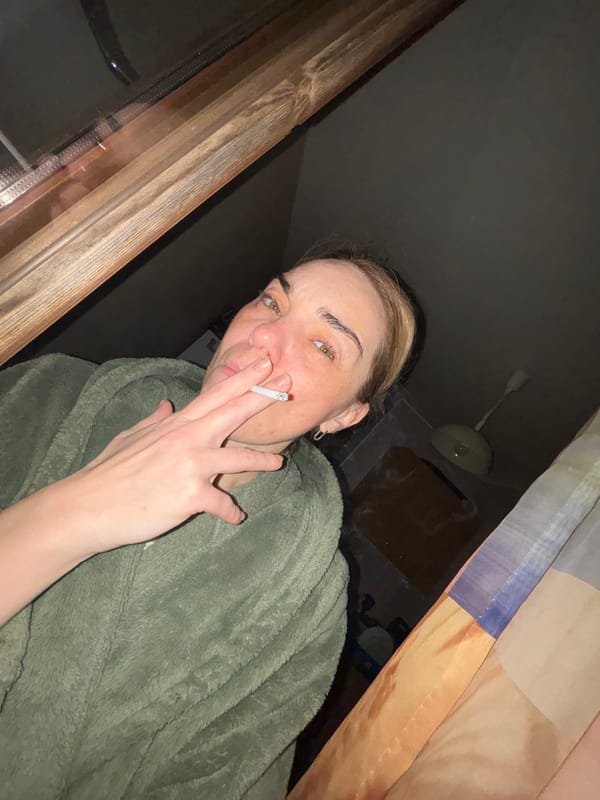 Person documents private moments at Russian residence in green robe