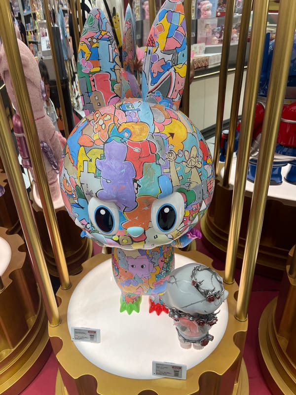Shopper documents toy stores and luxury retail at Jakarta mall