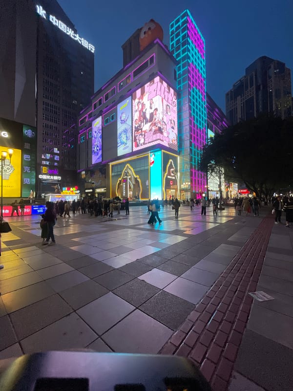 Routine pedestrian activity documented in Chongqing's bustling Jiefangbei district