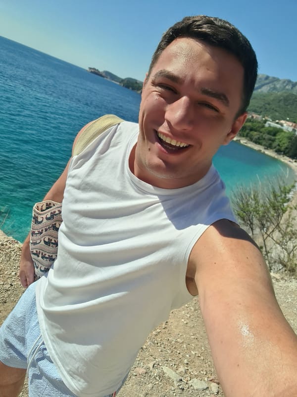 Man enjoys afternoon at Kamenovo beach, Montenegro