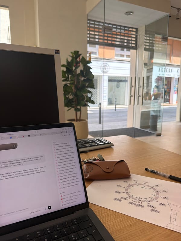 AI tool outputs on a laptop screen in a Dénia workspace