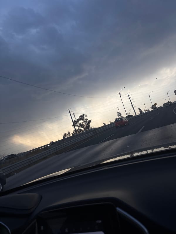 Vehicle travels highway near Cholula, Mexico with semi-truck ahead