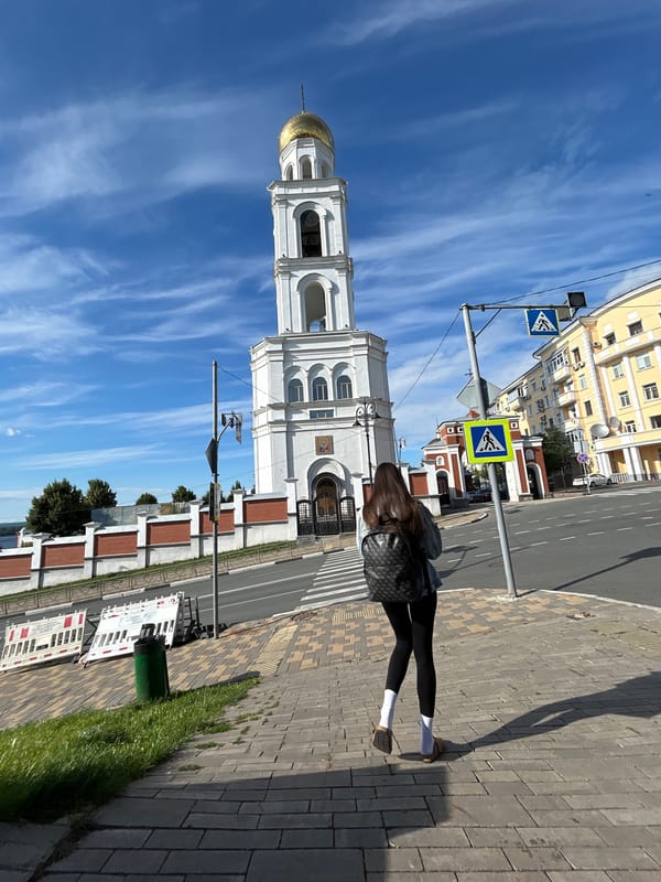 Casual afternoon stroll on a Samara sidewalk