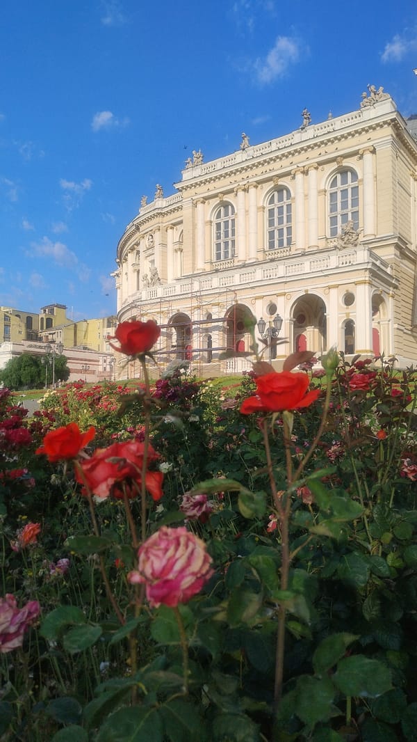 Up close with a classical landmark: columns, roses, and ornate details