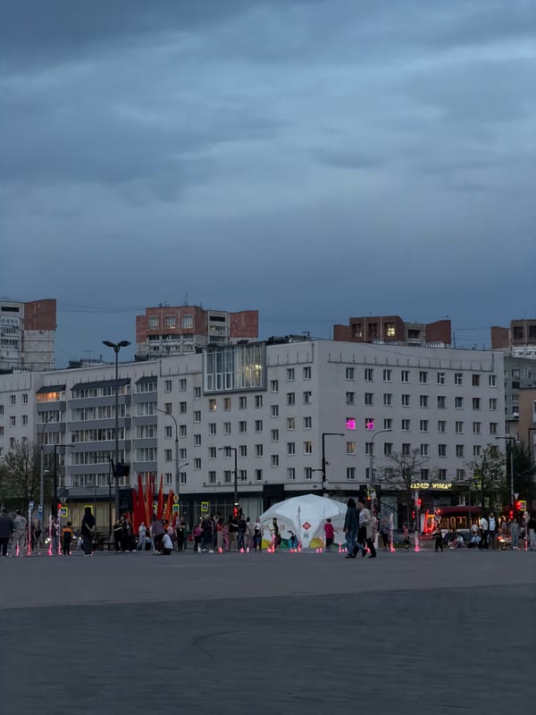 Evening street life captured in Perm city square