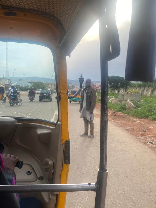 Auto-rickshaw ride through Jos and Rafin Par, Nigeria