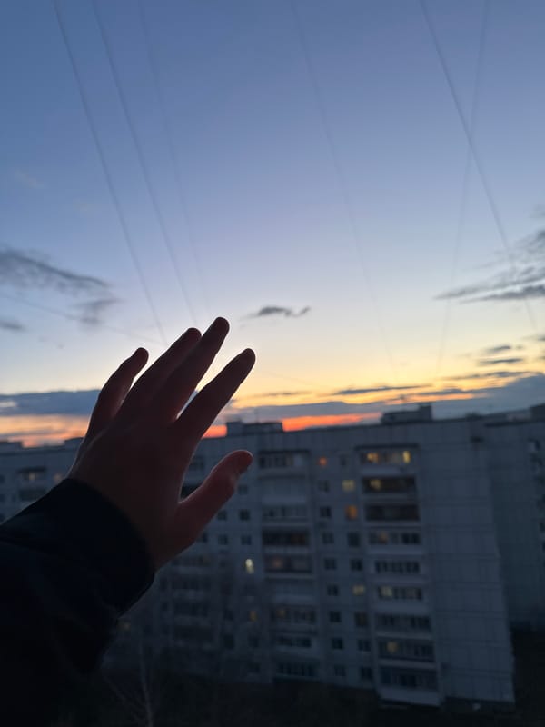 Woman swings at twilight in Chaikovsky, Russia park
