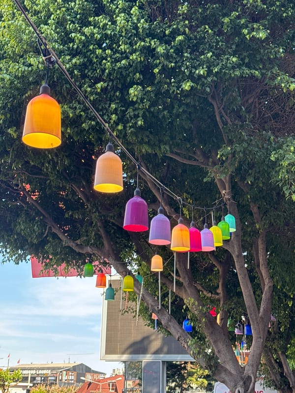 Colorful bell lights illuminate street scene in Alanya, Turkey