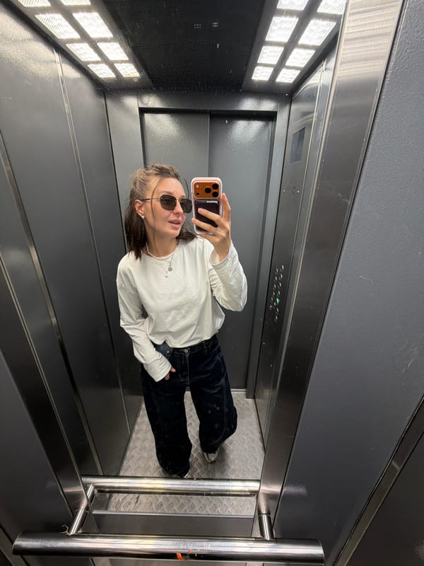 Woman takes elevator selfie in Moscow