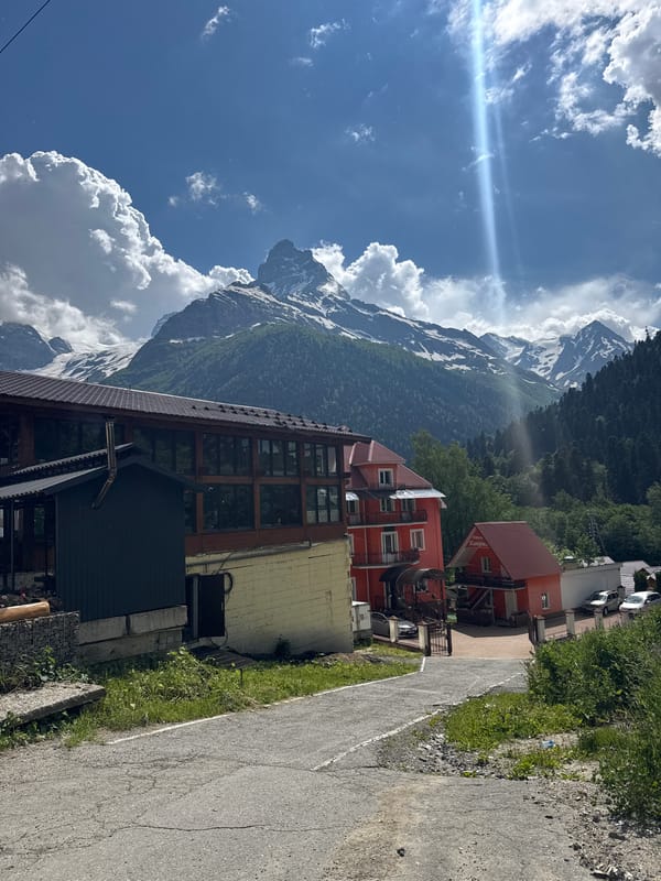 Dombay resort town: street life beneath the snow-capped Caucasus