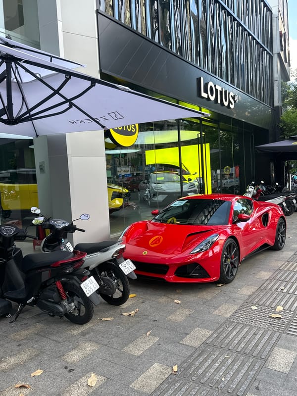 Thủ Đức streets, a Lotus dealership, and a café morning