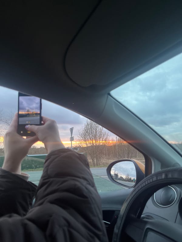 Driver captures dramatic sunset sky in Zaovrazh'e, Russia