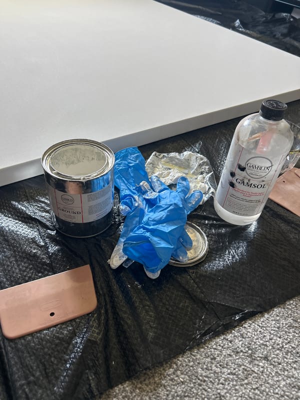 Artist works on painting project in Cape Coral studio