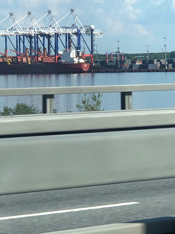 Motorist documents elevated highway travel through Kronstadt industrial port area