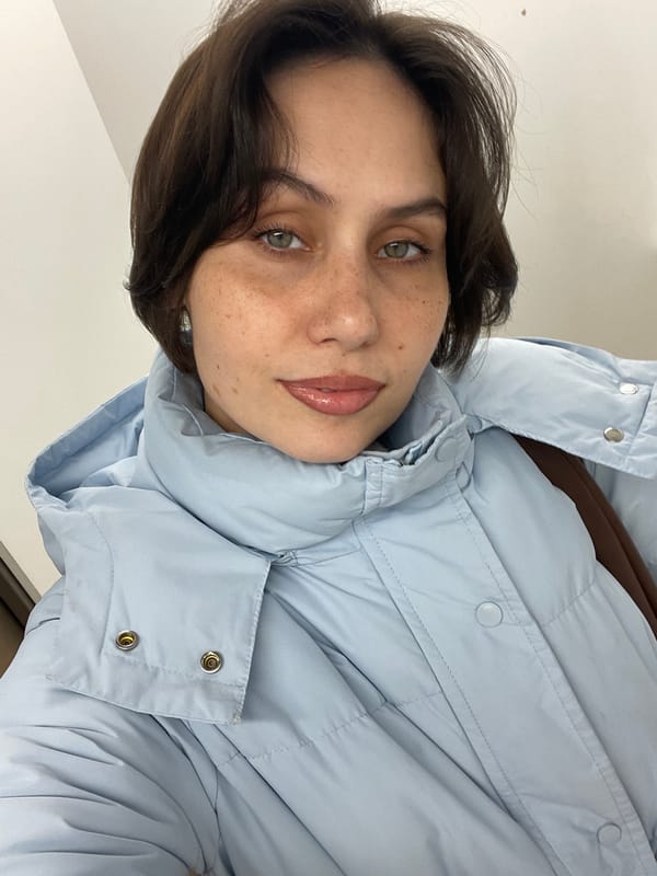 Woman documents personal moments in early morning Izhevsk session