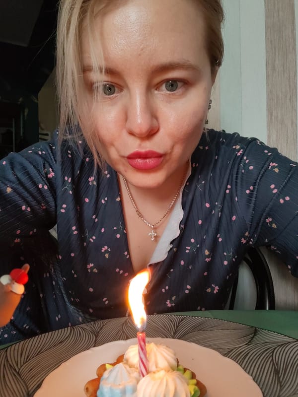 Birthday breakfast at home: candles, pastries, and fried eggs