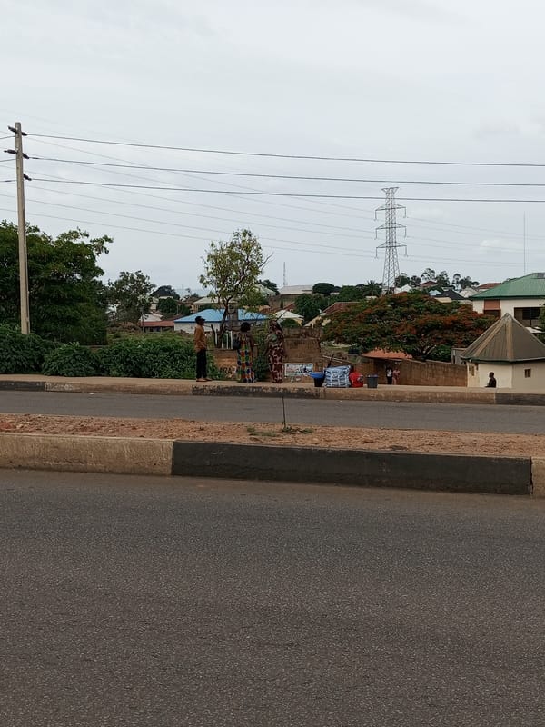 Street-level scenes from Gura Top, Nigeria on a cloudy afternoon