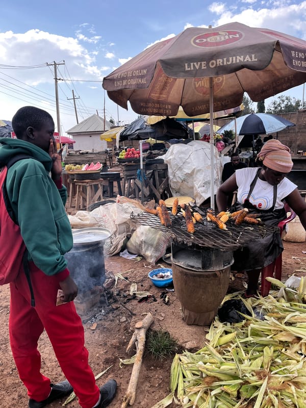 Daily market life continues amid rainfall in Gura Top, Nigeria