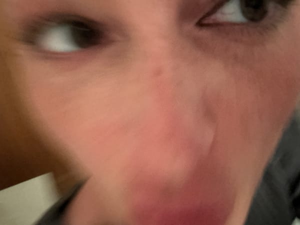 Close-up portrait captured in Wealden shows person with divergent gaze