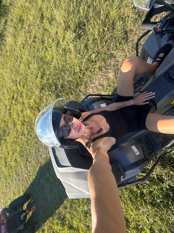 ATV stop in Tbilisi — helmet on, selfies in the sun