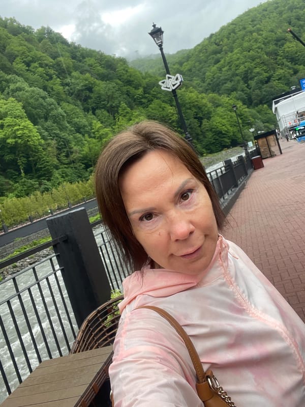 Tourist captures selfie, collects brochures at Rosa Khutor resort
