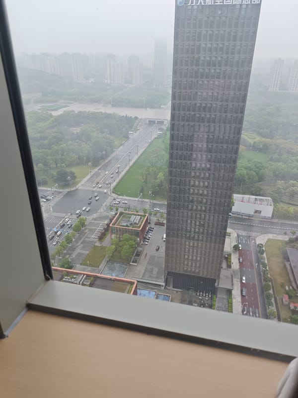 Heavy mist shrouds Liangjiang cityscape viewed from high-rise